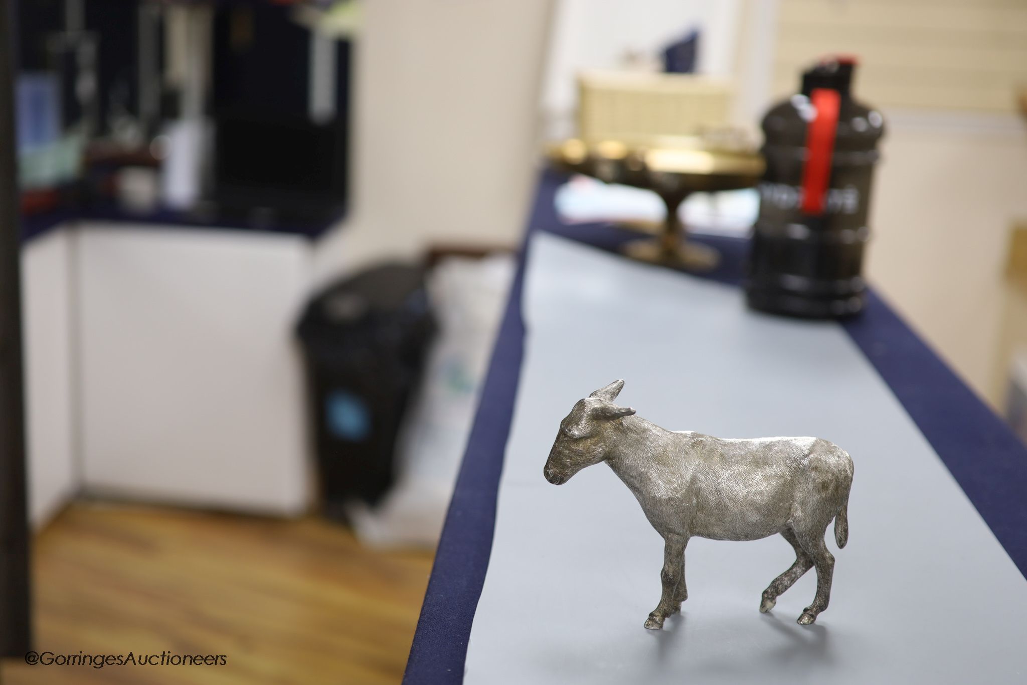 A 1960s' free standing silver miniature model of a donkey, Edward Barnard & Sons, London, 1964, height 12.5cm, 20.5oz.